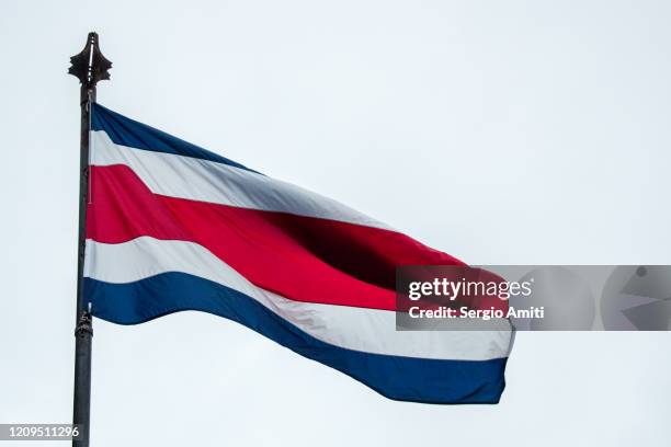 costa rican flag - costa rica flag stock pictures, royalty-free photos & images