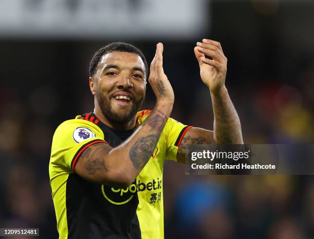 Troy Deeney of Watford celebrates at full time of the Premier League match between Watford FC and Liverpool FC at Vicarage Road on February 29, 2020...