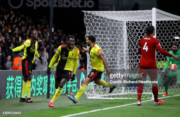 Ismaila Sarr of Watford celebrates after scoring his team's first goal during the Premier League match between Watford FC and Liverpool FC at...