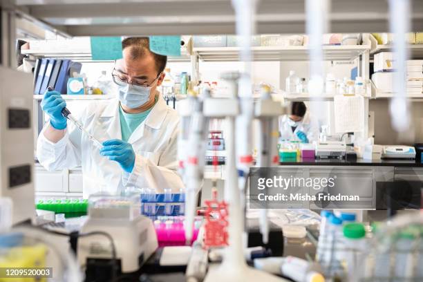Mirimus lab scientists preparing to test COVID-19 samples from recovered patients on April 8, 2020 in Brooklyn, New York City. New York City is the...
