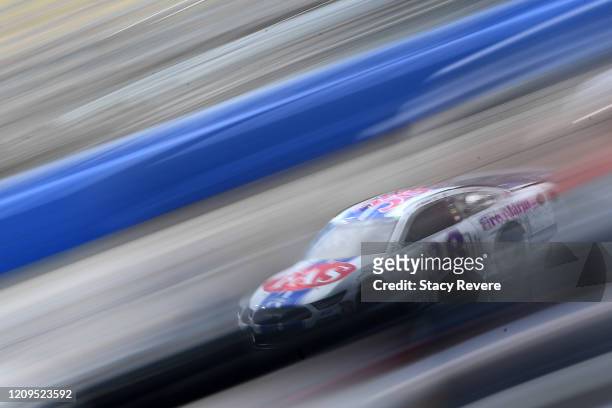 John Hunter Nemechek, driver of the Fire Alarm Services Ford, drives during qualifying for the NASCAR Cup Series Auto Club 400 at Auto Club Speedway...