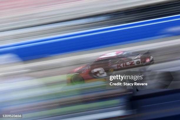 Austin Dillon, driver of the Dow Coatings Chevrolet, drives during qualifying for the NASCAR Cup Series Auto Club 400 at Auto Club Speedway on...