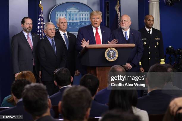 President Donald Trump speaks as Health and Human Services Secretary Alex Azar, National Institute for Allergy and Infectious Diseases Director...