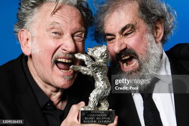 Benoit Delepine and Gustave Kervern pose with the Silver Bear 70th Berlinale for the film "Delete History" after the award ceremony of the 70th...