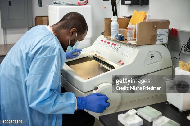 Histowiz lab scientists preparing to test COVID-19 samples from recovered patients on April 8, 2020 in Brooklyn, New York City. New York City is the...