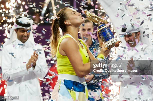 Aryna Sabalenka of Belarus celebrates with the trophy following he win in the Women's Singles Final match against Petra Kvitova of Czech Republic of...