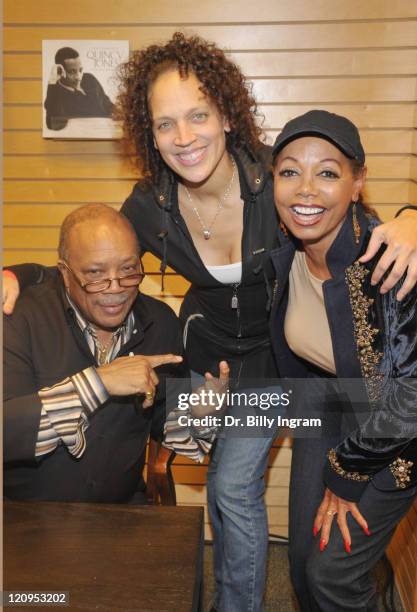 Legendary writer/producer Quincy Jones and his daughter Martina Jones, and Florence LaRue of the Fifth Dimension pose at the in-store appearance by...