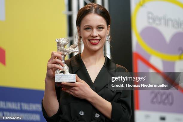 Paula Beer, winner of the Silver Bear for Best Actress for the film "Undine" speaks at the award winners press conference during the 70th Berlinale...