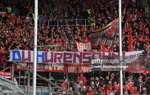 Fans of FC Bayern Muenchen show a banner against Dietmar Hopp during the Bundesliga match between TSG 1899 Hoffenheim and FC Bayern Muenchen at...