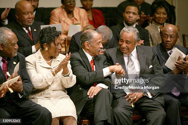 Rep. John Conyers, Jr. D-MI congratulates Rep. Charles Rangel, D-NY during the Ceremonial Swearing-In of The Congressional Black Caucus, 110...