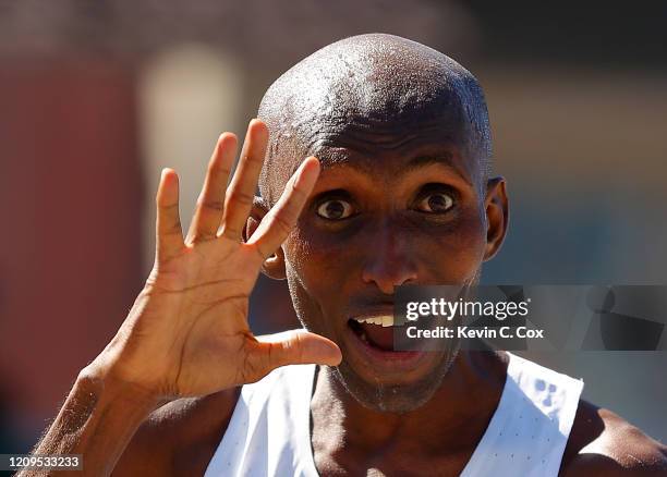 Abdi Abdirahman reacts after finishing in third place during the Men's U.S. Olympic marathon team trials on February 29, 2020 in Atlanta, Georgia.