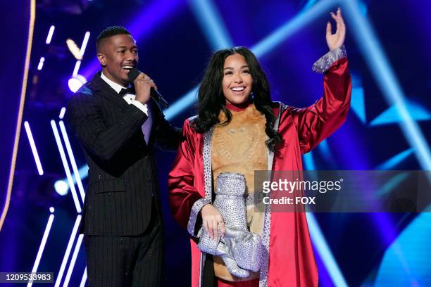 Host Nick Cannon and Jordyn Woods in the The Mother Of All Final Face Offs, Part 1 episode of THE MASKED SINGER airing Wednesday, April 8 on FOX.