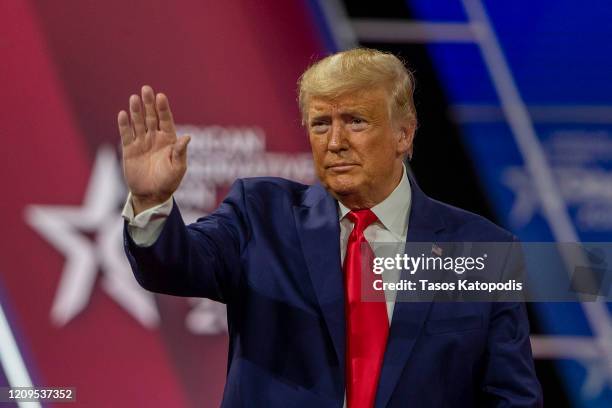 President Donald Trump acknowledges the crowd during the annual Conservative Political Action Conference at Gaylord National Resort & Convention...