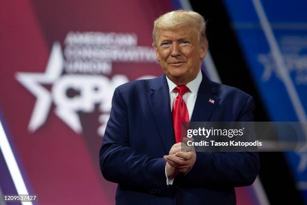 President Donald Trump acknowledges the crowd during the annual Conservative Political Action Conference at Gaylord National Resort & Convention...