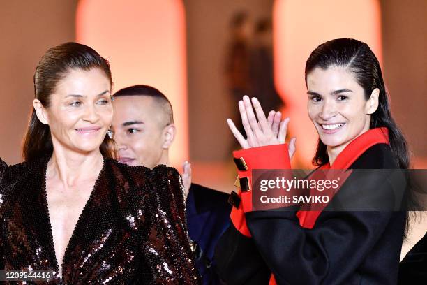 Helena Christensen, Olivier Rousteing and Caroline Ribeiro walks the runway during the Balmain Ready to Wear fashion show as part of the Paris...