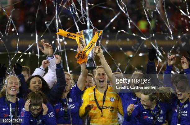 The players celebrate with the trophy after the FA Women's Continental League Cup Final Chelsea FC Women and Arsenal FC Women at City Ground on...