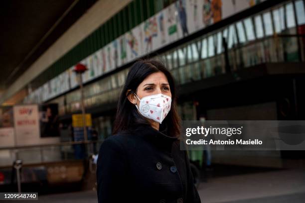 Rome Mayor Virginia Raggi visits the Termini train station as Italian Red Cross staff begin to carry out body temperature checks with a thermoscanner...