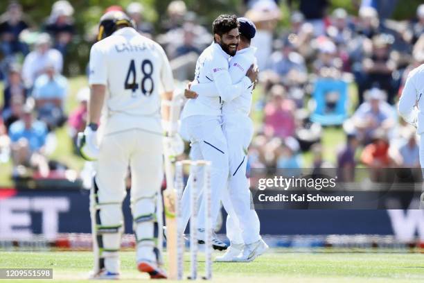 Ravindra Jadeja of India is congratulated by team mates after dismissing Ross Taylor of New Zealand during day two of the Second Test match between...