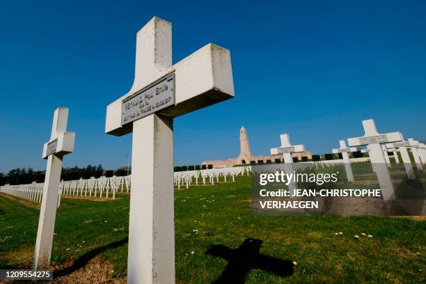 This photograph taken on April 8 shows a general view of The Douaumont Ossuary in Douaumont, eastern France, where the graves of some 16142 graves of...