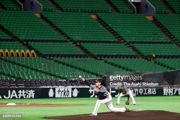 Baseball spring training game between Fukuoka SoftBank Hawks and Hanshin Tigers is held behind closed doors amid increasing fear of COVID-19 new...