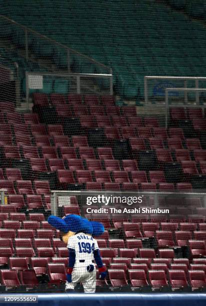 Chunichi Dragons mascot Doala is seen in the empty stand as a baseball spring training game between Hiroshima Toyo Carp and Chunichi Dragons is held...