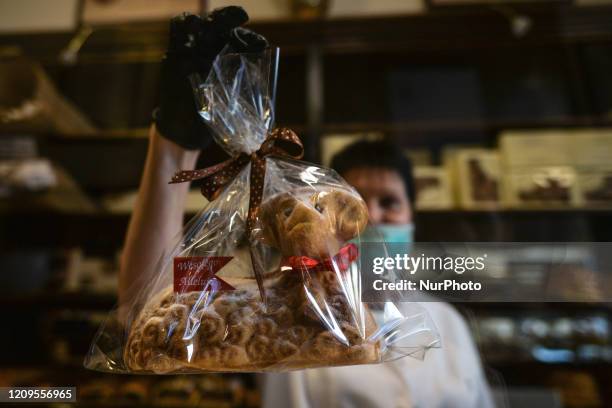 Lady holds a traditional Easter lamb in the Cukiernia Cichowscy bakery in Krakow's center. On Wednesday, April 8 in Krakow, Poland.