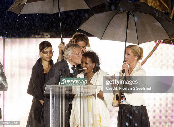 Actor Karl Heinz Boehm, his wife Almaz and daughter Aida attend the Save The World Awards at the nuclear power station Zwentendorf on July 24, 2009...
