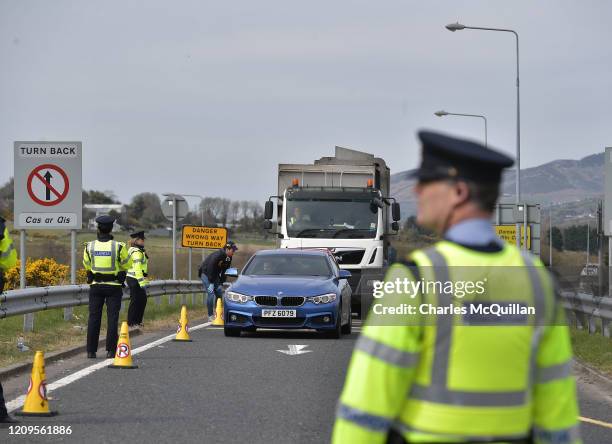 Gardai police officers man a checkpoint on the border between the Republic of Ireland and Northern Ireland as they check for non essential travel...