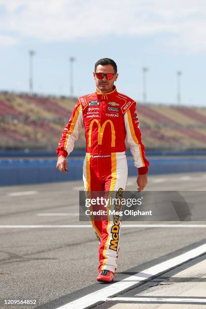 Kyle Larson, driver of the McDonald's Chevrolet, walks on the grid before qualifying at Auto Club Speedway on February 29, 2020 in Fontana,...