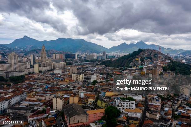 Aerial view showing Rio de Janeiro's city center with the Central do Brasil train station , Corcovado Mountain and Providencia favela during the...