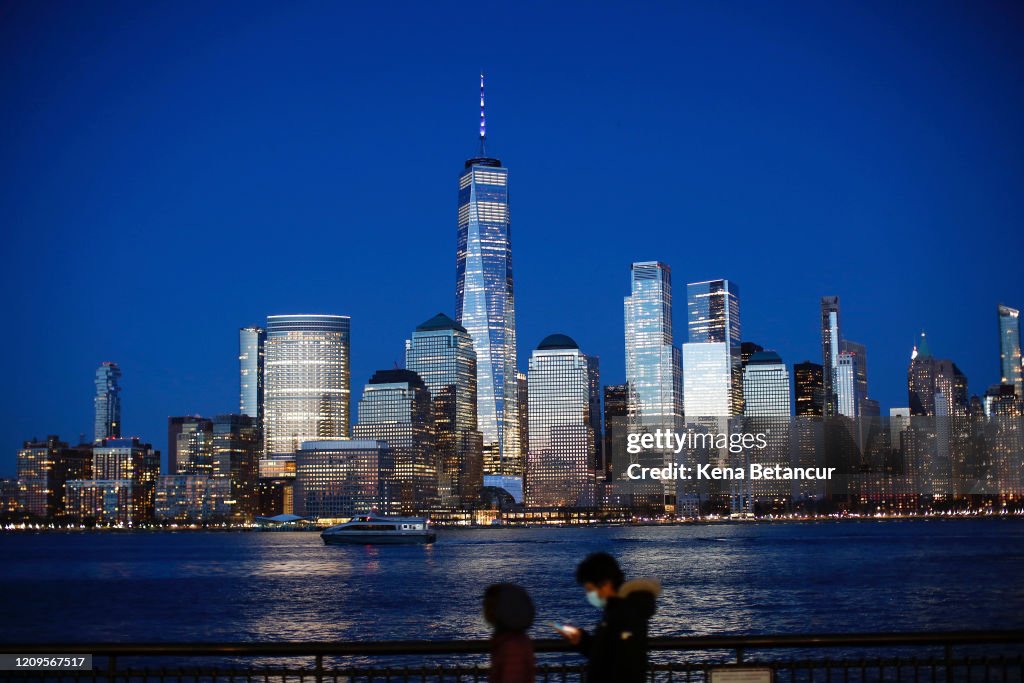 Across U.S., Stadiums, Landmarks Illuminated In Blue To Honor Essential Workers