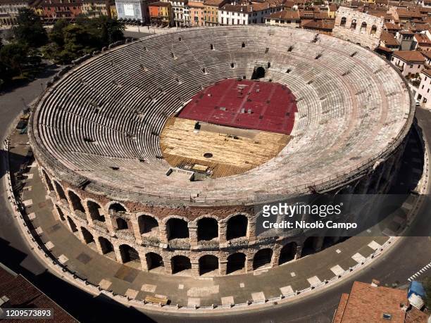 General view shows almost deserted Verona Arena in Piazza Bra. The Italian government imposed unprecedented restrictions to halt the spread of...