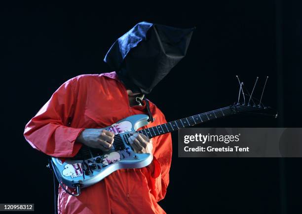 Tom Morello of the band Rage Against The Machine dresses up as Guantanamo Bay prisoners, in orange jumpsuits and black hoods in protest to the US...