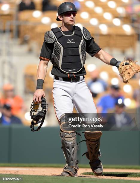 Rob Brantley of the San Francisco Giants catches against the Chicago White Sox on February 25, 2020 at Camelback Ranch in Glendale Arizona.