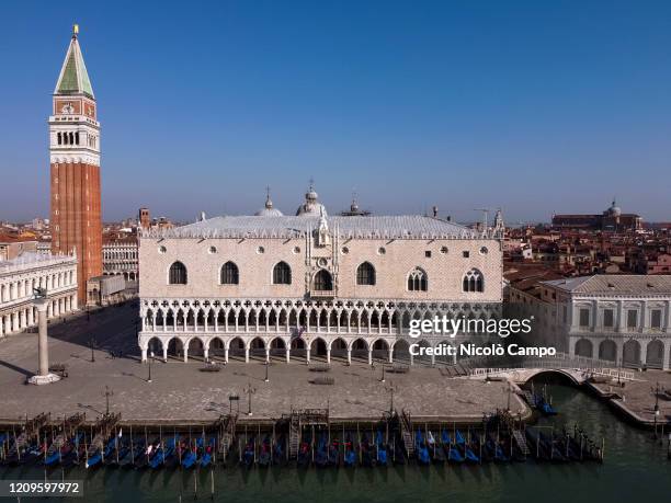 General view shows almost deserted Riva degli Schiavoni. On the background there are Campanile di San Marco and Doge's Palace. The Italian government...