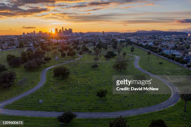 An aerial view of Evergreen Cemetery as coronavirus infections accelerate on April 10, 2020 in Los Angeles, California. Health and elected officials...