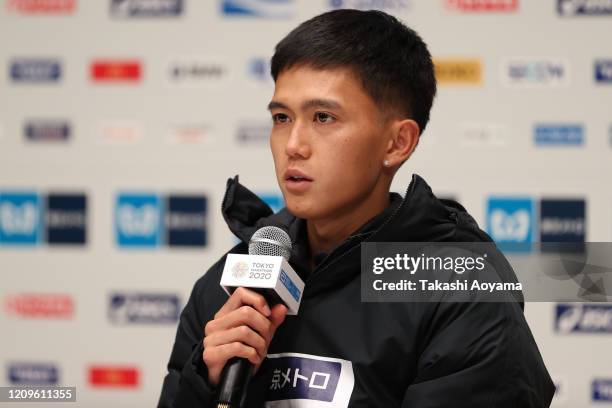 Men’s competition fourth place and new Japanese national record holder Suguru Osako of Japan speaks to the media after the awards ceremony following...