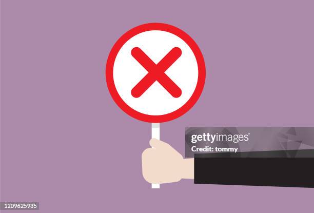 businessman holds a wrong sign - resolve conflict stock illustrations