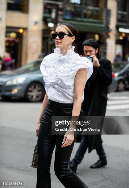 Brittany Xavier is seen wearing white blouse, black pants outside Ralph & Russo during Paris Fashion Week - Womenswear Fall/Winter 2020/2021 : Day...