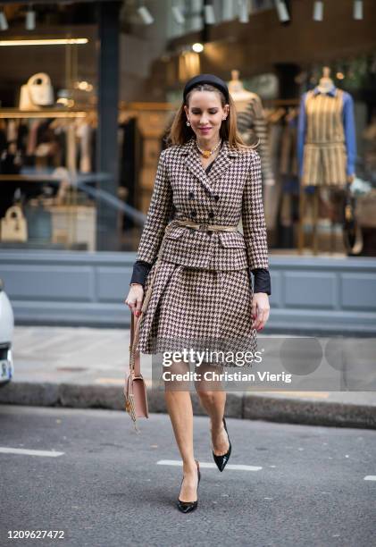 Alexandra Lapp is seen wearing Dior Spring/Summer 2020 Prêt-à-Porter collection, Natural Dior Blazer, Natural Dior skirt and Belt, 30 Montaigne bag,...