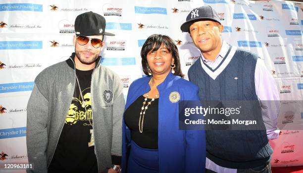 Drama, Monique Tate, Manager-Diversity Marketing for Chrysler Financial and Hip-Hop Summit Action Network Chairman Russell Simmons attend the "Get...