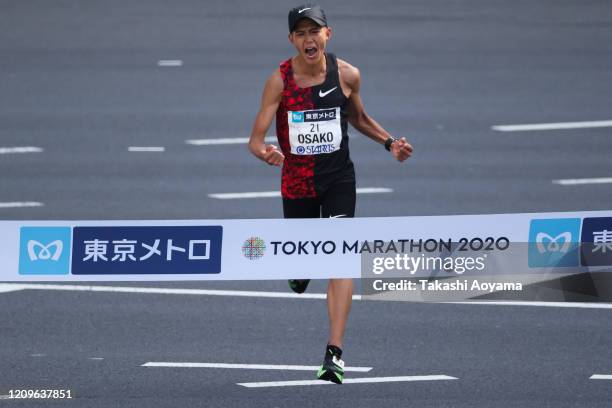 Fourth place and new Japanese national record holder Suguru Osako of Japan approaches the finish line in the men’s competition during the Tokyo...