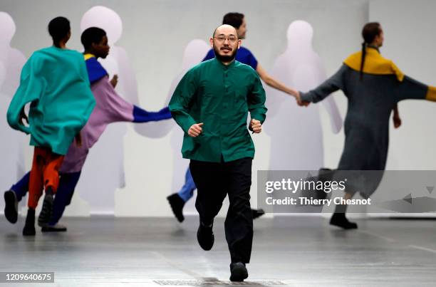 Designer Satoshi Kondo walk the runway during the Issey Miyake as part of the Paris Fashion Week Womenswear Fall/Winter 2020/2021 on March 01, 2020...