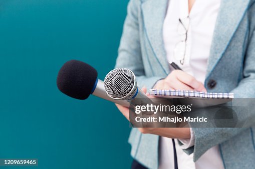 Reporter Example News Reporter Or Tv Journalist At Press Conference Holding Microphone ...