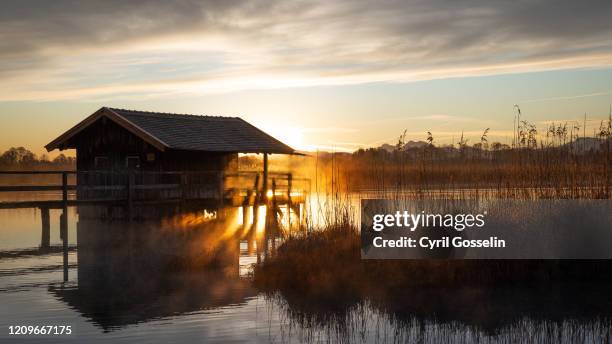 boathouse and chiemsee - sonnenstrahlen stock pictures, royalty-free photos & images