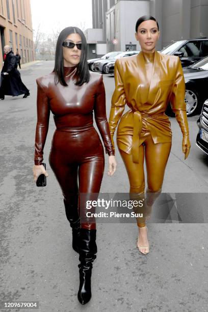 Kourtney and Kim Kardashian attend the Balenciaga show as part of the Paris Fashion Week Womenswear Fall/Winter 2020/2021 on March 01, 2020 in Paris,...