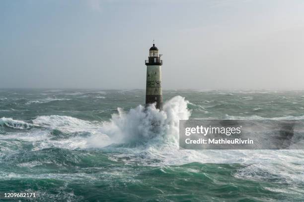 storm ciara in bretagne with huge waves - ar-men lighthouse - bretagne photos et images de collection