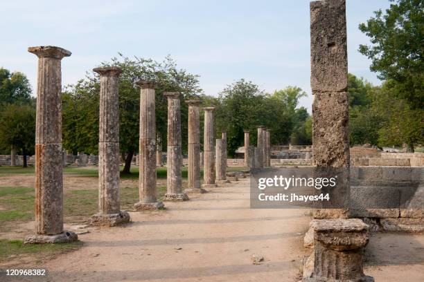 column lined street in olympia - olympia stock pictures, royalty-free photos & images