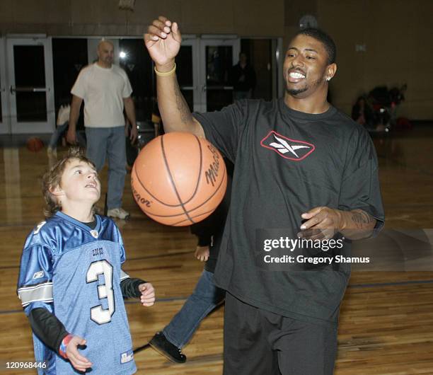 Detroit Lion Kevin Jones plays basketball at The Hot Spot during Super Bowl XL festivities at the Boll Family YMCA in Detroit, Michigan on Feb. 4,...