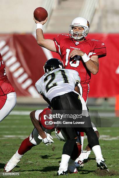 Arizona Cardinals quarterback Kurt Warner unleashes a pass downfield during a game against the Jacksonville Jaquars at Sun Devil Stadium in Tempe, AZ...